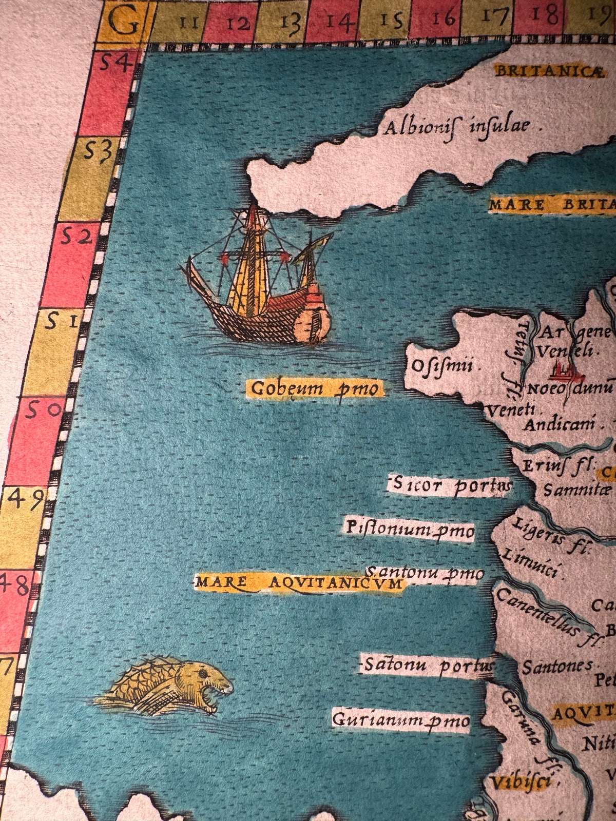1599 Ptolemaic Map of France – Tabula Europae III – Sea Monster & Sailing Ship